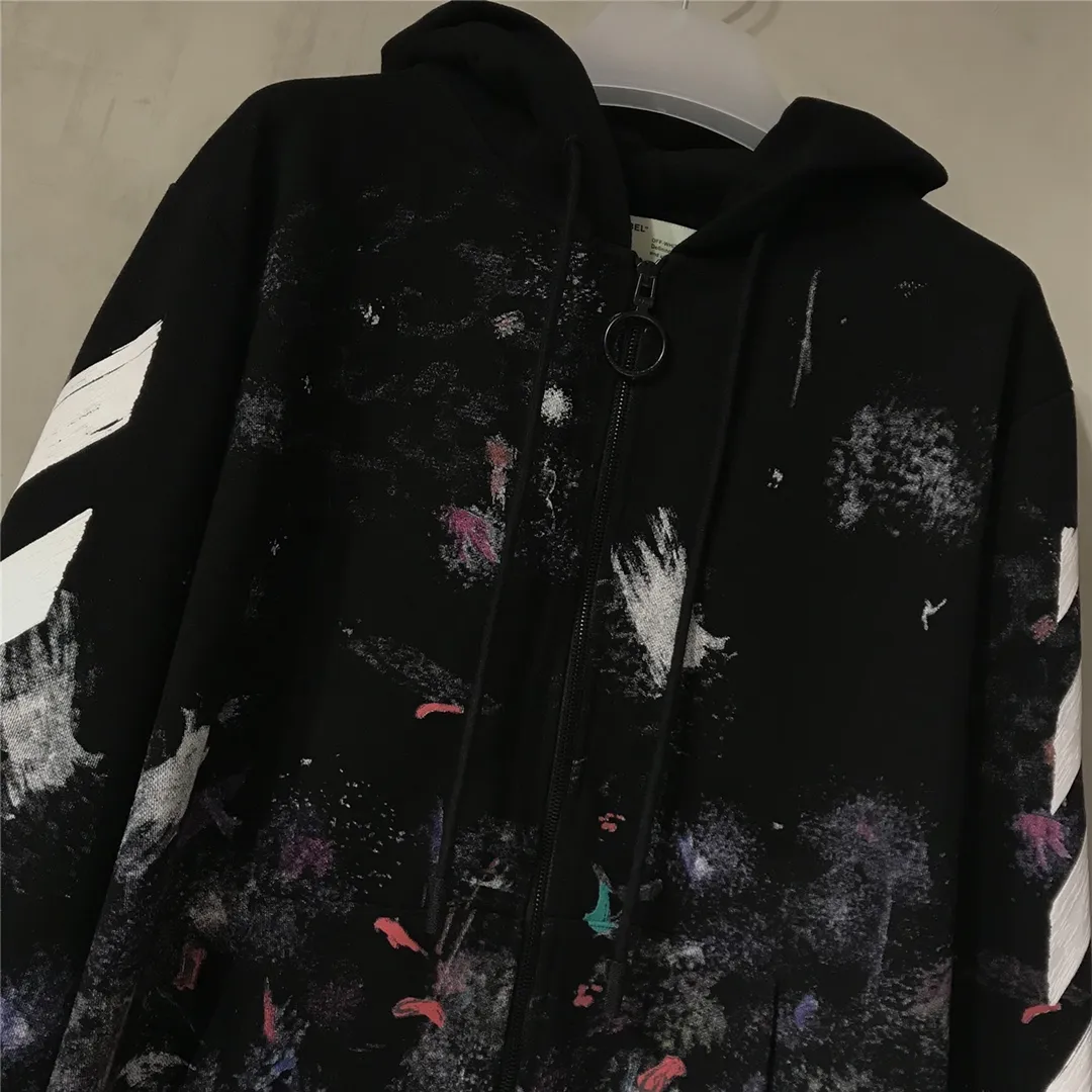 The top tested version for spring and autumn OFFWHITE Starry Sky Fireworks Melbourne Limited Ink Splash Hoodie Hooded Zip Jacket Sweatshirt Fabric: Made of custom-made (more than 490 grams - double-ply large terry fabric at the counter) high-weight fabric made into clothes that look more textured, soft to the touch, super thick, classic version, small dropped shoulders, micro silhouette! Pay attention to the important points~ The weight of more than 490 grams is not exaggerated and does not contain water. Those sellers who brag about the weight can only deceive novice customers. But when you get our goods, the weight and sinking are right there. You can taste it yourself, and the texture does not lie! (100% cotton fabric, no pilling) The white arrows on the back + the stripes on the arms are all made of foam and have a feel and protrusions. The fireworks color system is obtained through contrasting printing. There are eight panels in the whole body. Seven color sets and eight panels are printed in eight times. The first layer is gray, the second layer is white, the third layer is yellow, the fourth layer is green, the fifth layer is blue, the sixth layer is purple, the seventh layer is orange. The last layer is arrow paint printing. The seven colors are layered on each other, which will also create new colors. The arrows on the back and the front squares are first glued and then hung in four layers. The paint has an obvious concave and convex feeling. Quality speaks for itself in the details. The blue letters are electrostatic three-dimensional flocking, which is done separately and then printed through high-temperature thermal transfer‼ ️It can be called a fake killer, you can see that every detail on the clothes is ceiling craftsmanship‼ ️ Size chart